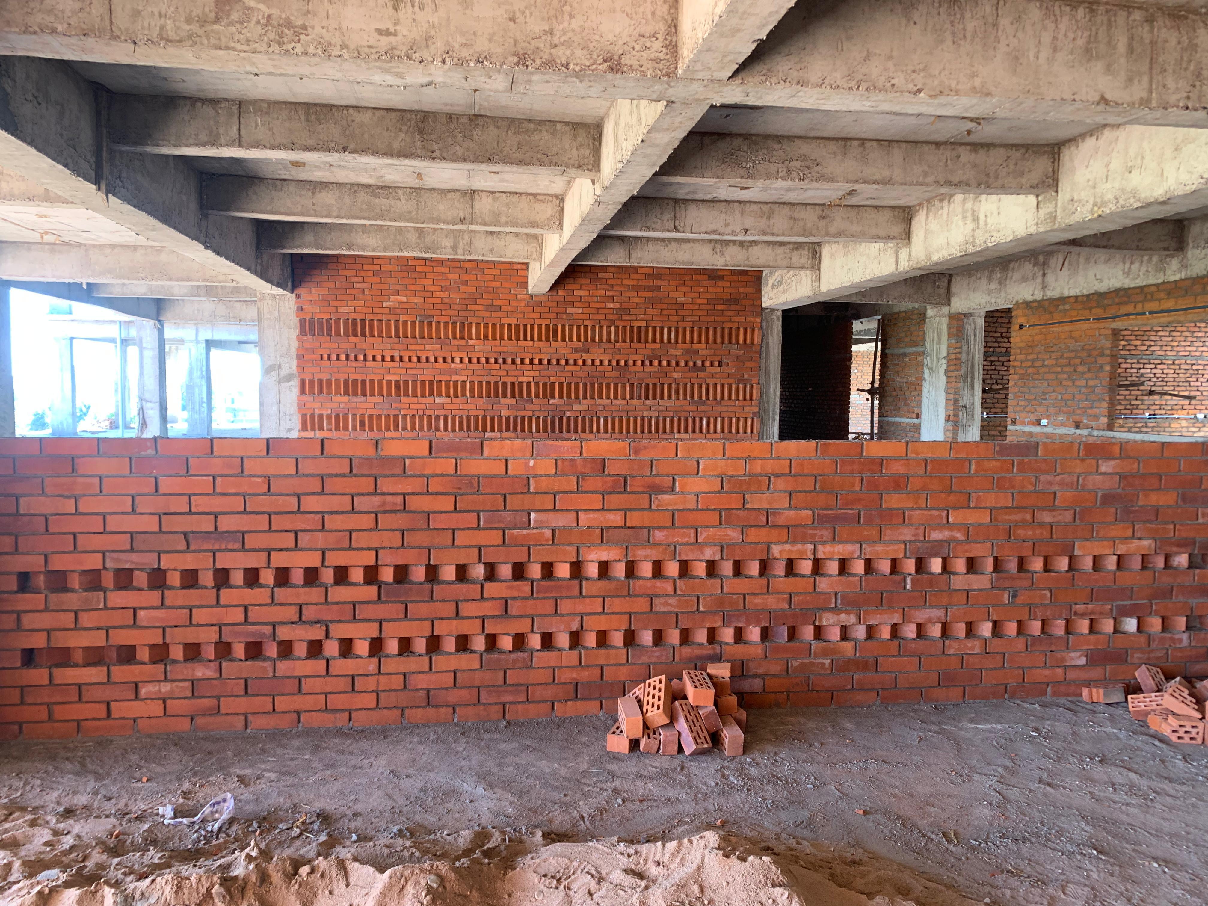 Wire cut brick wall with door opening — Bricks Street