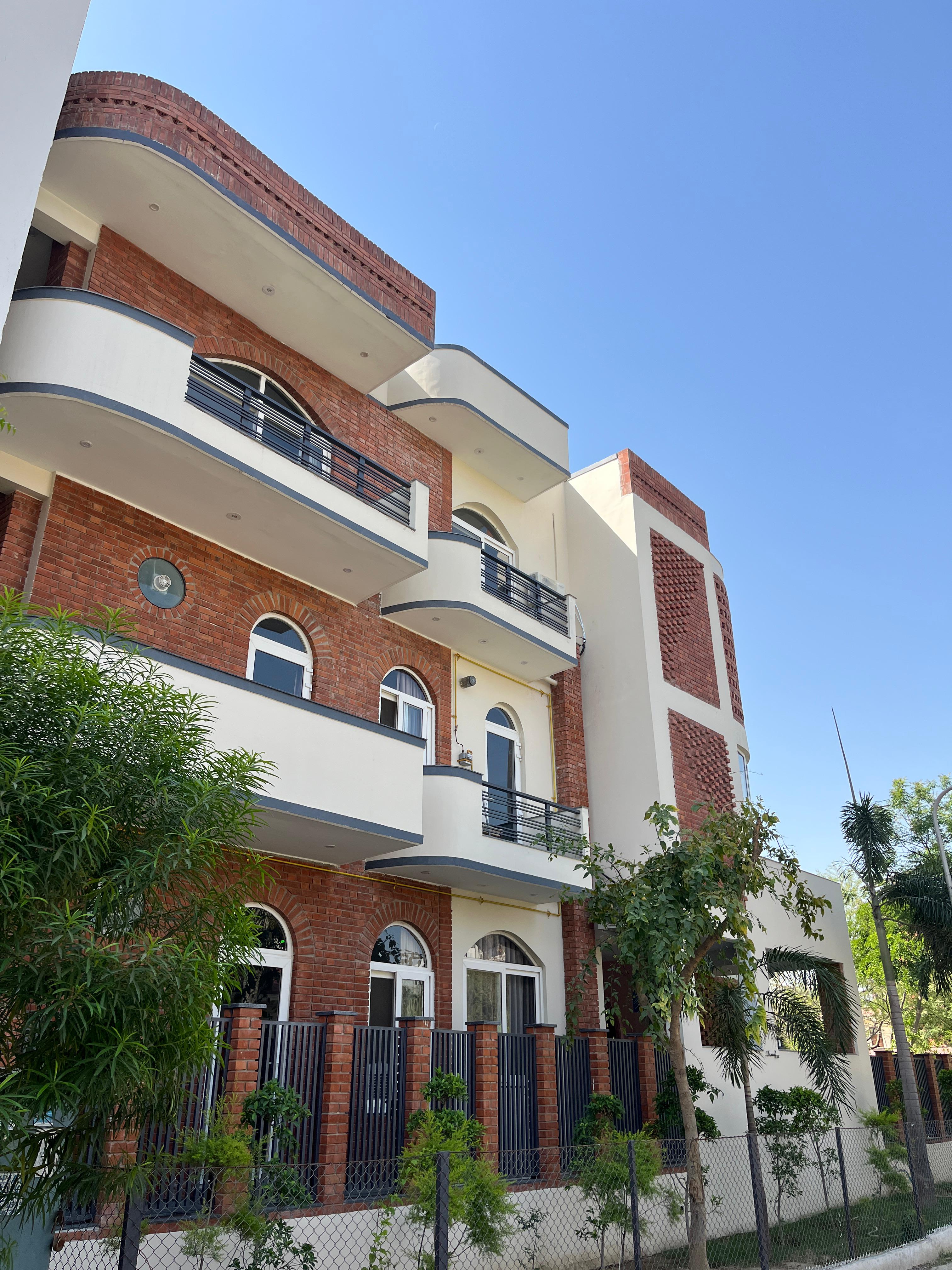 Completed multi-storey residential building with wire cut bricks — Bricks Street