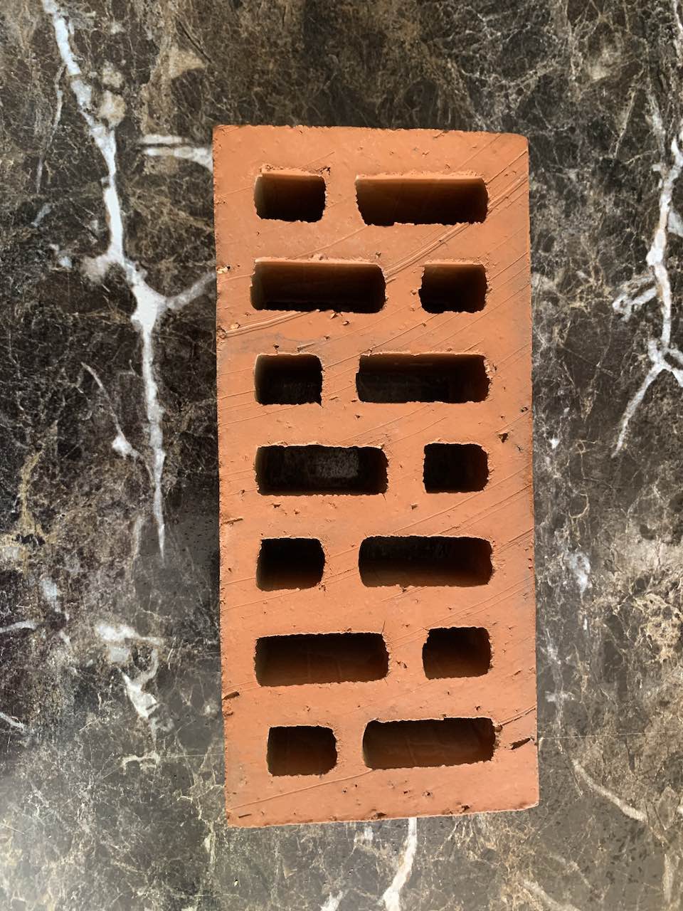 Multi Hole Dark Wire Cut Bricks